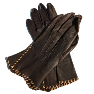 Perrin Brown leather table cut gloves with tan stitching.